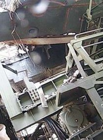 14-Tepco-released-photos-of-Reactor-1-Fuel-handling-machine-hung-just-above-SFP-to-support- (Copier)